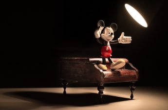 Mickey Mouse on a piano